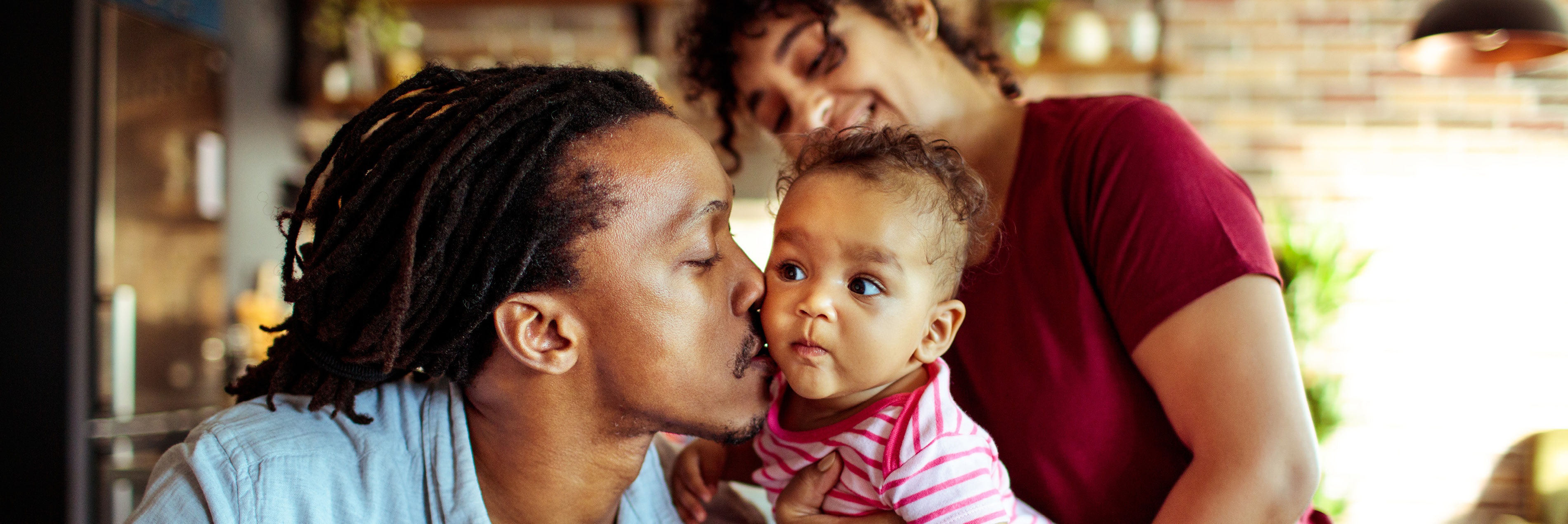 Mother and Father with their baby