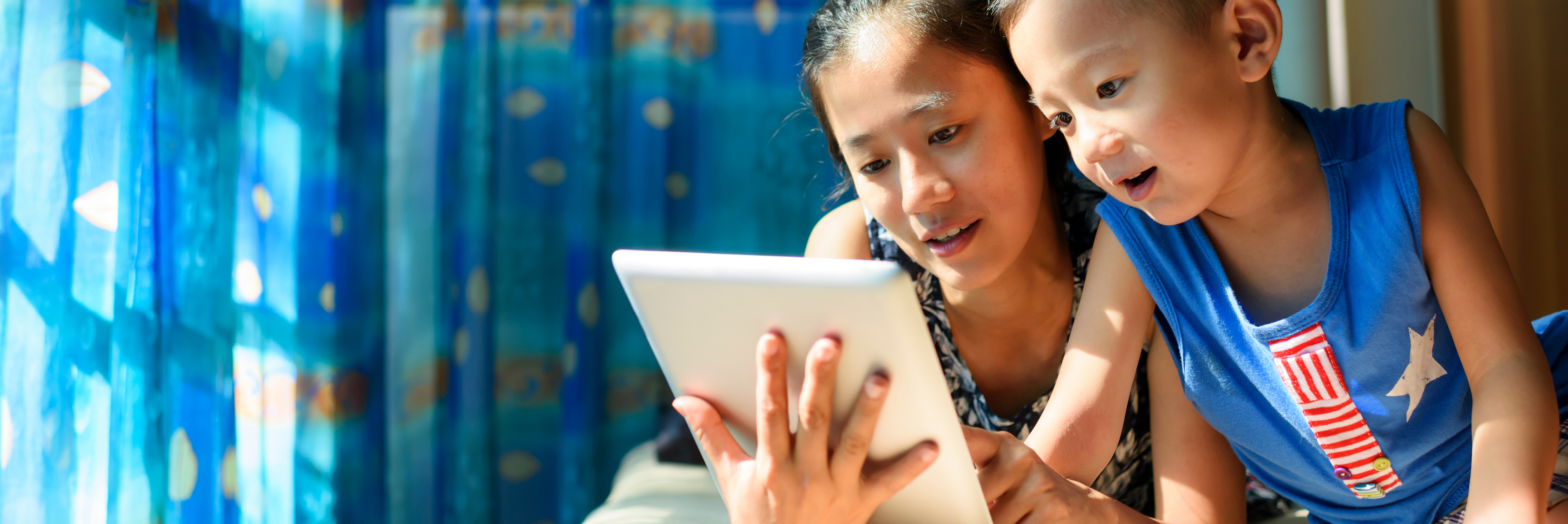 Mother and son on tablet