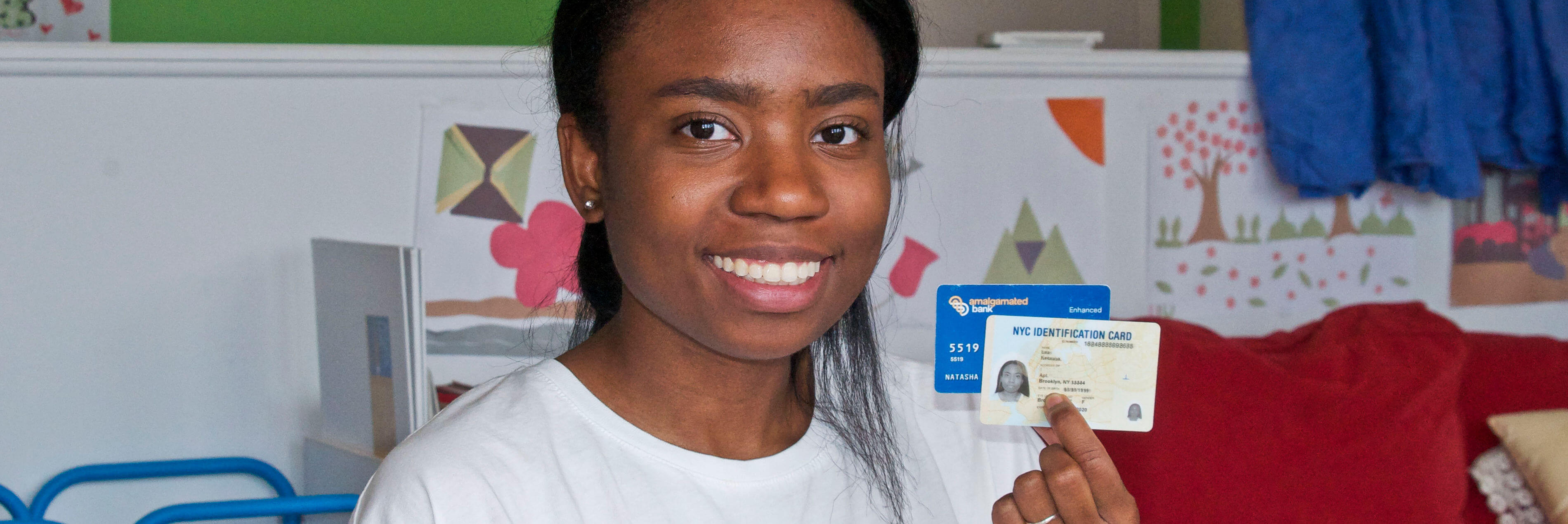 Woman holding ID