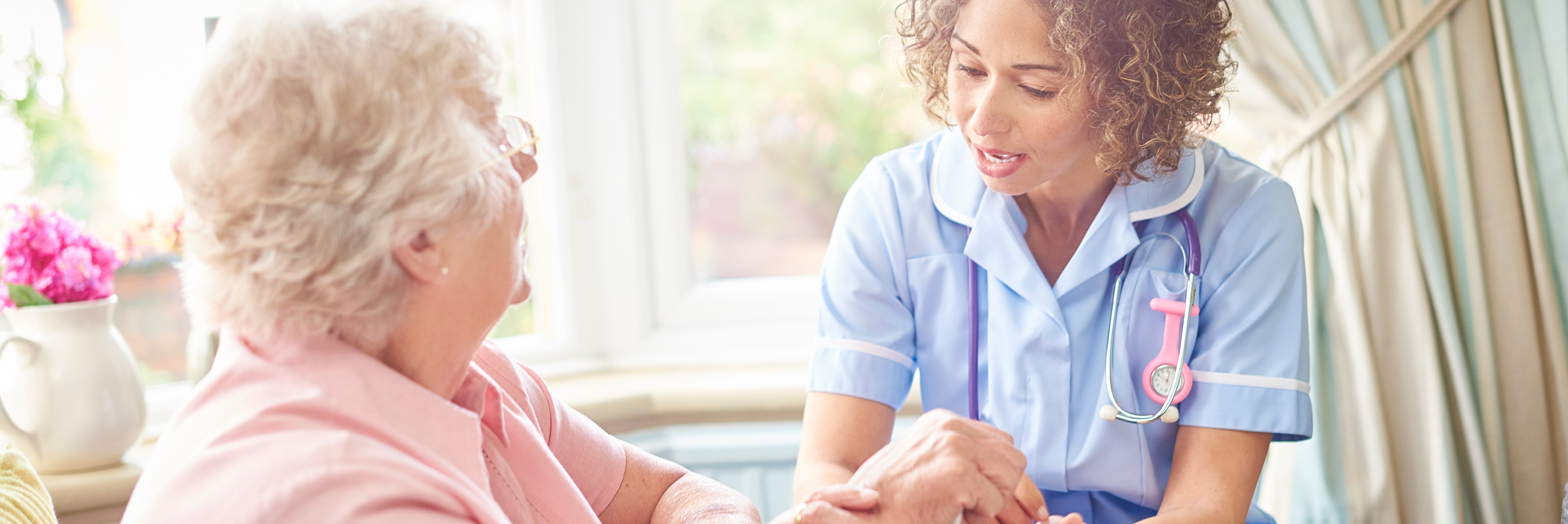 Nurse with elderly woman